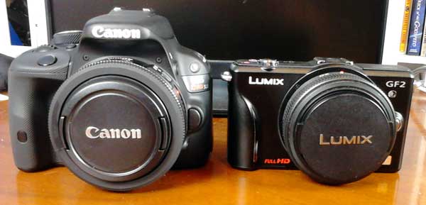 Canon sl1 lumix gf2 front