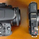 Size comparison of Canon EOS Rebel SL1 with Lumix GF2